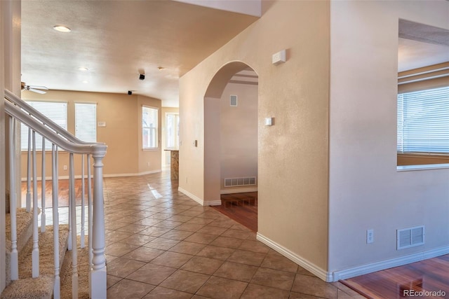 corridor with tile patterned floors