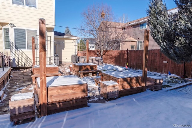 view of snow covered deck