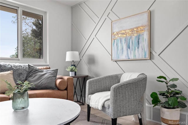 living area featuring hardwood / wood-style floors