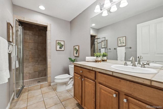 3030 Wyandot St Unit 4, Denver, CO 80211 - full bathroom with toilet, a stall shower, vanity, tile patterned floors, and recessed lighting