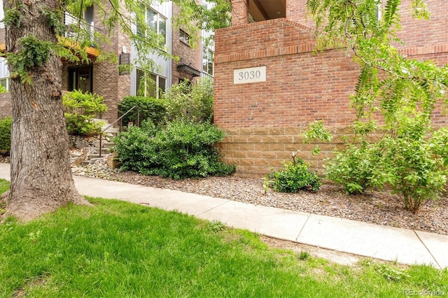 3030 Wyandot St Unit 4, Denver, CO 80211 - view of home's exterior with a balcony and brick siding