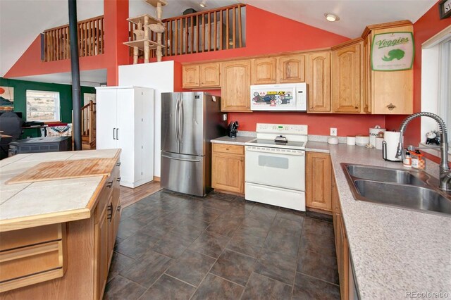 2727 Arrowhead Dr, Como, CO 80432 - kitchen featuring white appliances, high vaulted ceiling, and sink