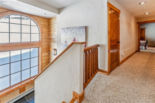 hallway featuring an upstairs landing, recessed lighting, carpet, and baseboard heating