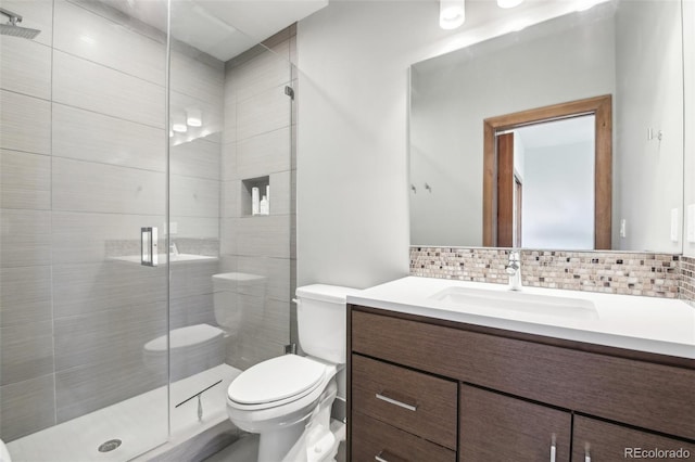 784 Grand Horizon Vw, Manitou Springs, CO 80829 - full bath with toilet, vanity, a shower stall, and tasteful backsplash
