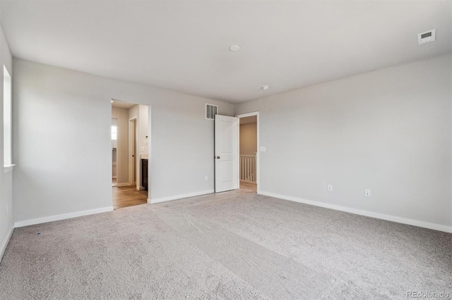 view of carpeted spare room