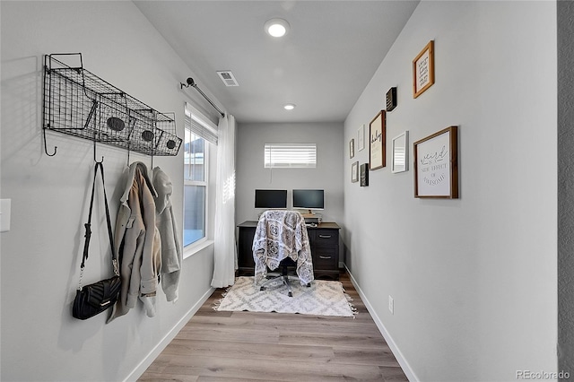 office area with light hardwood / wood-style flooring