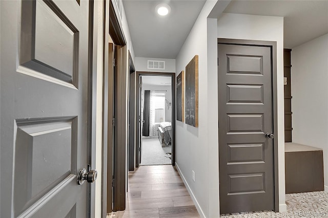 hall featuring light wood-type flooring