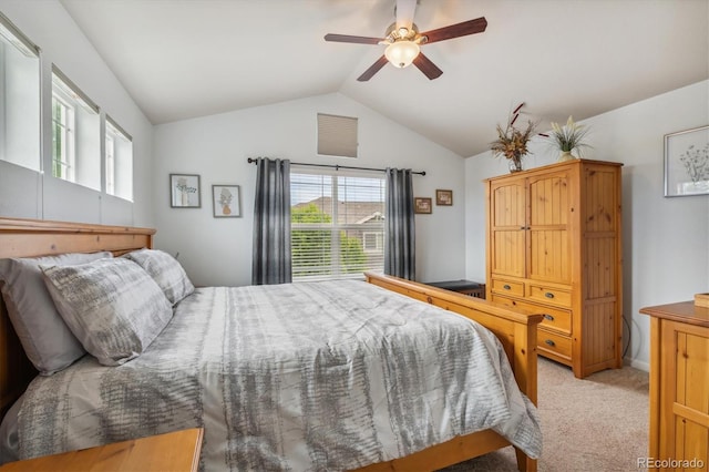 carpeted bedroom featuring ceiling fan and lofted ceiling