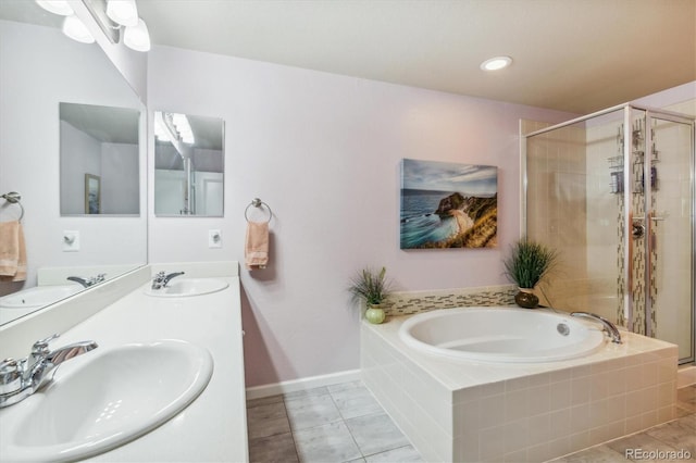 bathroom featuring tile patterned flooring, vanity, and independent shower and bath