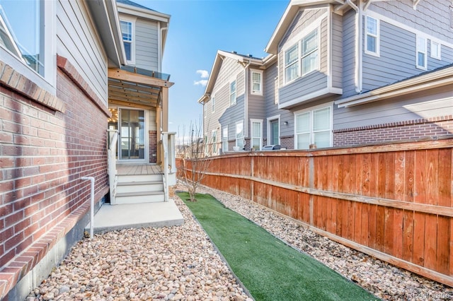 view of yard featuring fence