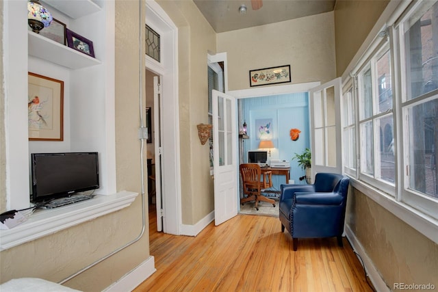 living area featuring light hardwood / wood-style floors