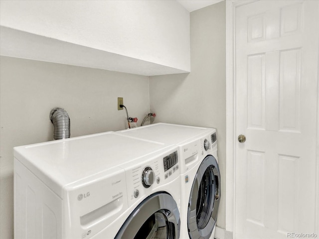 12798 Tomahawk Rd, Parker, CO 80138 - laundry room featuring independent washer and dryer and laundry area