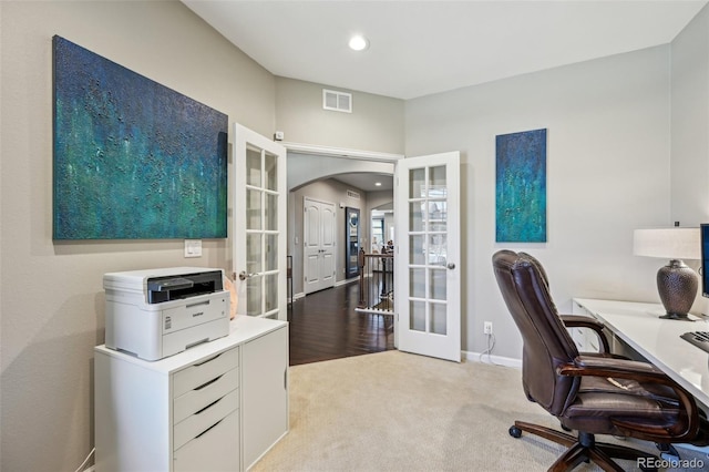 27423 E Euclid Dr, Aurora, CO 80016 - home office featuring french doors, arched walkways, carpet flooring, baseboards, and recessed lighting