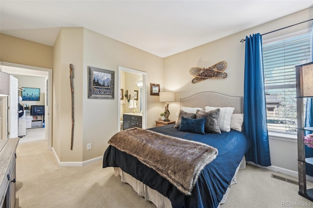 27423 E Euclid Dr, Aurora, CO 80016 - bedroom with light colored carpet, baseboards, and ensuite bath