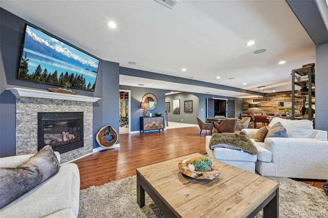 27423 E Euclid Dr, Aurora, CO 80016 - living room with wood finished floors, recessed lighting, a fireplace, and baseboards
