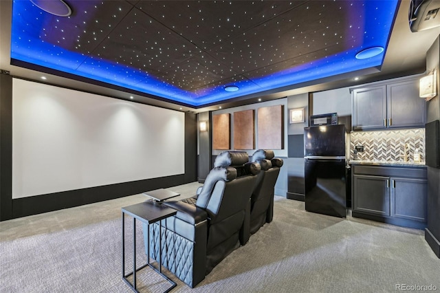 27423 E Euclid Dr, Aurora, CO 80016 - home theater room with a raised ceiling and light colored carpet