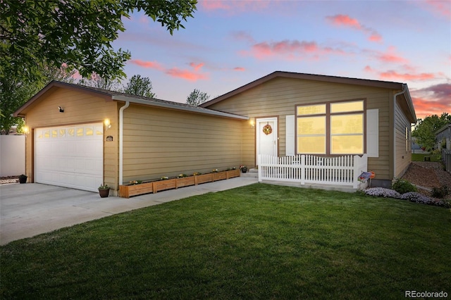 6231 Indian Paintbrush St Unit 214, Frederick, CO 80530 - single story home with a garage, a lawn, a porch, and concrete driveway