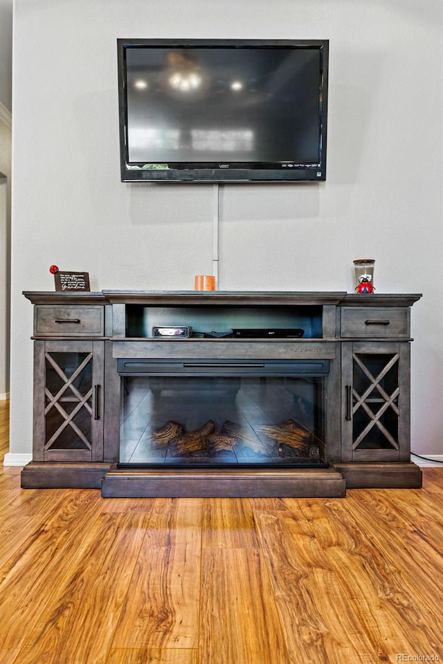 6231 Indian Paintbrush St Unit 214, Frederick, CO 80530 - detailed view of wood finished floors and baseboards