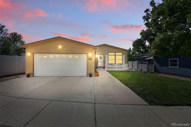 6231 Indian Paintbrush St Unit 214, Frederick, CO 80530 - ranch-style home with concrete driveway and an attached garage