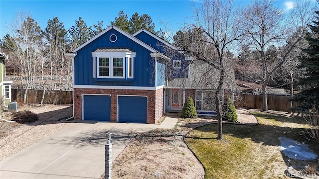 view of front facade featuring fence, board and batten siding, concrete driveway, a garage, and brick siding