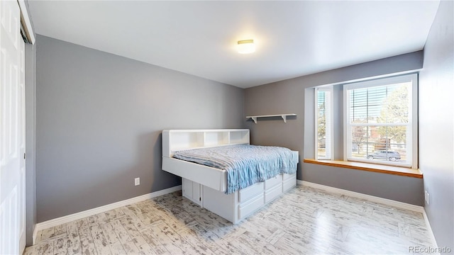 bedroom featuring baseboards