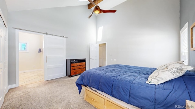 carpeted bedroom featuring beam ceiling, high vaulted ceiling, a barn door, baseboards, and ceiling fan