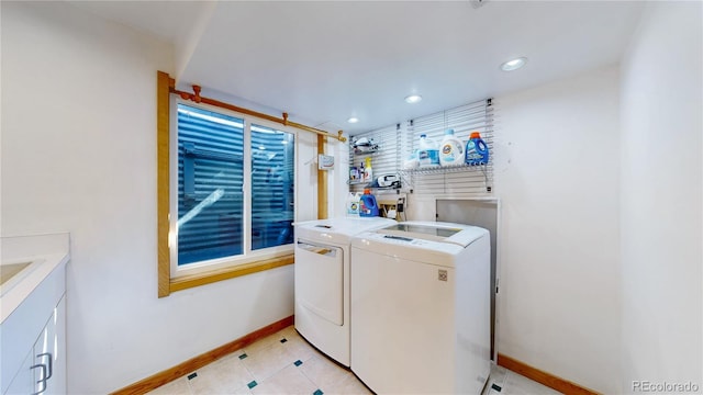 laundry room with washing machine and dryer, recessed lighting, light tile patterned floors, baseboards, and laundry area