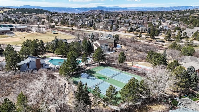 birds eye view of property featuring a mountain view and a residential view