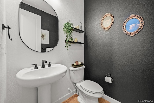 5078 S Quail St, Littleton, CO 80127 - bathroom featuring wood finished floors and toilet