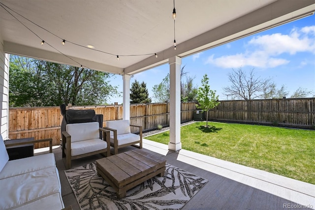 5078 S Quail St, Littleton, CO 80127 - fenced backyard featuring outdoor lounge area and a patio