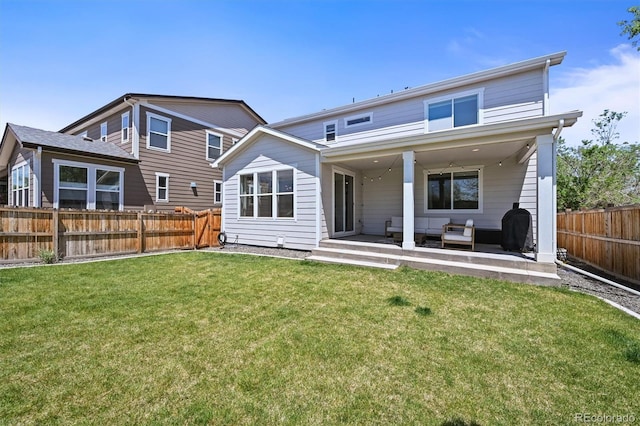 5078 S Quail St, Littleton, CO 80127 - back of house featuring an outdoor hangout area, a fenced backyard, and a patio area