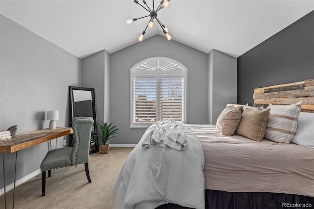 carpeted bedroom with baseboards, lofted ceiling, and a notable chandelier