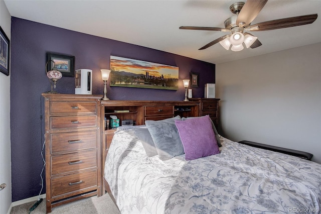 bedroom with carpet floors and a ceiling fan