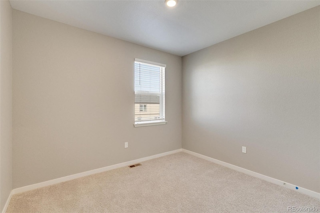 view of carpeted spare room