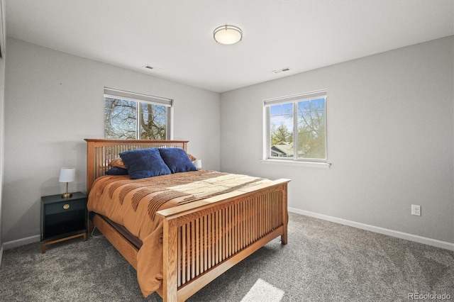 4942 Grove St, Denver, CO 80221 - carpeted bedroom with baseboards and visible vents