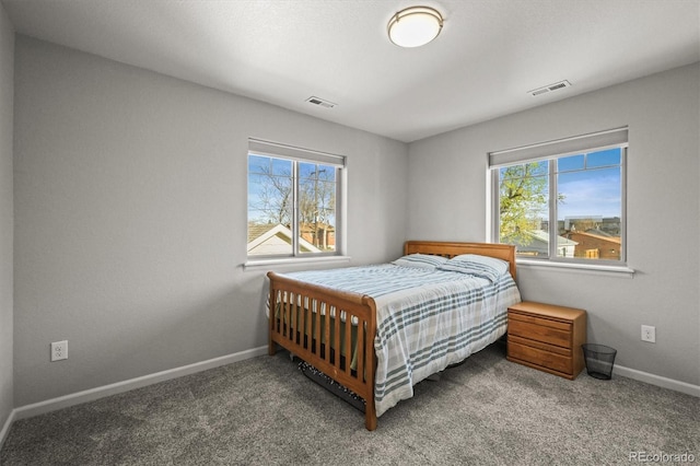 4942 Grove St, Denver, CO 80221 - carpeted bedroom featuring baseboards and visible vents