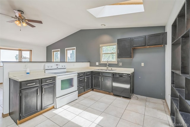 18 Clover Cir, Colorado Springs, CO 80906 - kitchen with white electric range, black dishwasher, vaulted ceiling, a skylight, and a peninsula