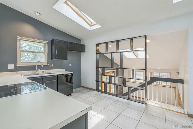 18 Clover Cir, Colorado Springs, CO 80906 - kitchen with black dishwasher, a skylight, lofted ceiling, healthy amount of natural light, and light countertops