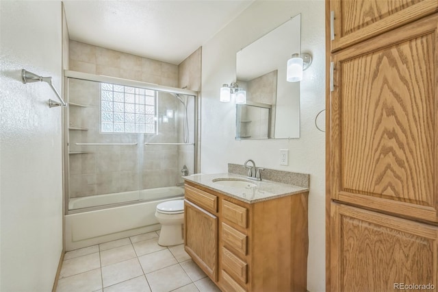 18 Clover Cir, Colorado Springs, CO 80906 - full bath featuring vanity, combined bath / shower with glass door, and tile patterned flooring