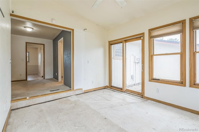 18 Clover Cir, Colorado Springs, CO 80906 - carpeted empty room featuring baseboards and lofted ceiling