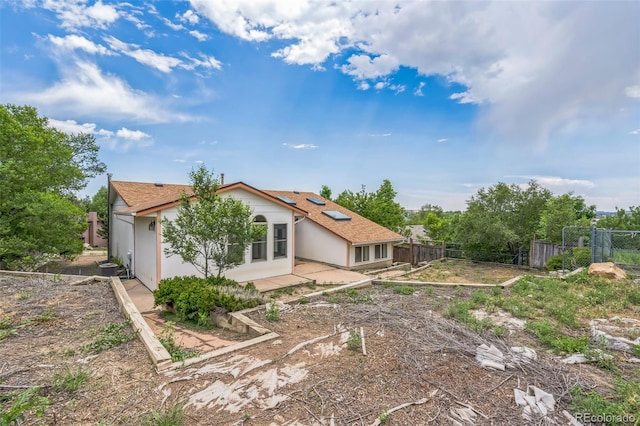18 Clover Cir, Colorado Springs, CO 80906 - rear view of property with a patio area and stucco siding