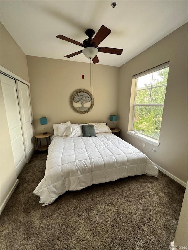 1441 Central Unit 305, Denver, CO 80211 - carpeted bedroom featuring a closet and ceiling fan