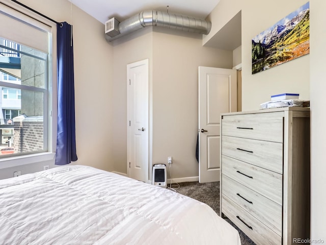 1441 Central Unit 305, Denver, CO 80211 - carpeted bedroom featuring baseboards