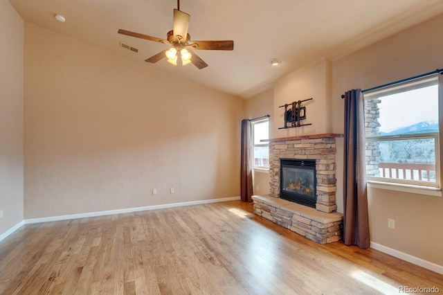 121 M And M Ln Unit 6C, Salida, CO 81201 - unfurnished living room with lofted ceiling, baseboards, a fireplace, and wood finished floors