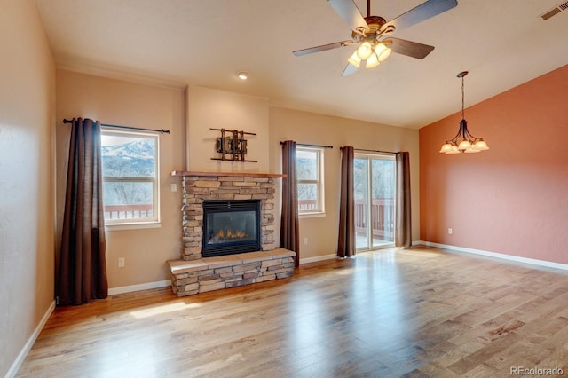 121 M And M Ln Unit 6C, Salida, CO 81201 - unfurnished living room featuring baseboards, a fireplace, visible vents, and wood finished floors