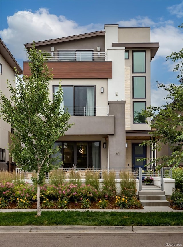 modern home featuring a balcony