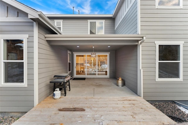 entrance to property featuring a deck