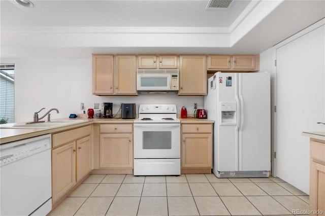 20835 E 47th Ave, Denver, CO 80249 - kitchen featuring light brown cabinets, a sink, and white appliances