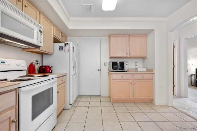 20835 E 47th Ave, Denver, CO 80249 - kitchen with visible vents, light brown cabinets, and white appliances
