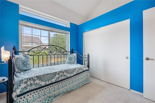 20835 E 47th Ave, Denver, CO 80249 - bedroom featuring a closet, carpet floors, and vaulted ceiling